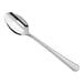 A close-up of a GET slotted stainless steel spoon with a mirror finish and a handle.