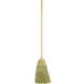 A Carlisle 5-stitch janitor broom with a wooden handle.