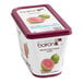 A white container of Les Vergers Boiron frozen pink guava puree with a label.
