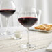 a glass of wine on a table