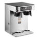 A silver and black Bunn ICB Twin Infusion Series coffee maker with two coffee pots on top.