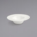 A white Front of the House Catalyst Monaco porcelain saucer with a hole in the middle.