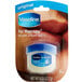 A small container of Vaseline Lip Therapy Original lip balm.