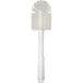 A close-up of a white Carlisle Sparta multi-purpose cleaning brush with white bristles.