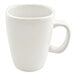 A plain white porcelain mug with a handle.