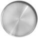 a close-up of a silver circular surface