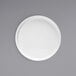 A Front of the House Soho bright white porcelain plate with a raised rim on a white background.