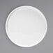 A Front of the House Soho bright white porcelain plate with a raised rim on a white background.