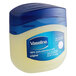 A plastic container of Vaseline Petroleum Jelly with a blue lid.