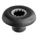 A black Vitamix blender drive socket with a hole in the center.