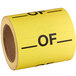 a roll of yellow label