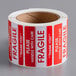 A roll of Lavex Please Handle with Care Fragile labels.