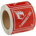 a roll of red and white stickers