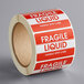 a roll of fragile liquid label