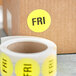 a roll of label with yellow circles
