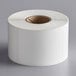 A roll of white Globe E13 permanent labels.