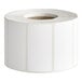 A roll of white blank permanent direct thermal labels.