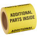 a roll of yellow tape with black text