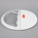 a white plastic lid with a clear lid