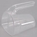 A clear plastic container with a long white handle and a clear plastic cup attached to the end.