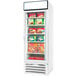 A Beverage-Air white glass door merchandiser with food inside.