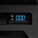 A Beverage-Air MarketMax glass door merchandiser with a digital display showing temperature.