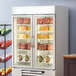 a refrigerator with food in it