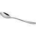 A close-up of an Arcoroc stainless steel dinner spoon with a silver handle.