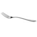 An Arcoroc stainless steel cocktail fork with a silver handle.