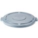 A grey Rubbermaid Brute trash can lid.