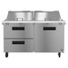 a stainless steel kitchen with drawers