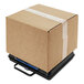 A Brecknell box on top of a black utility bench scale.