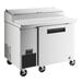 A stainless steel refrigerator on wheels.