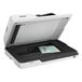 A white Epson DS-1630 document scanner with a passport inside.