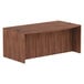 A walnut Alera Valencia bow front desk shell.