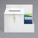 A white Deflecto desktop suggestion box with a lock and key.