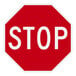 A red and white rectangular stop sign with white text that reads "Stop"