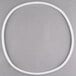A white plastic ring with a white circle inside on a gray background.