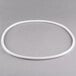 A white rubber circle on a gray surface.