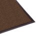 A brown Guardian WaterGuard carpet mat with a black border.