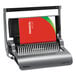 A close-up of a Fellowes Quasar 130-Sheet Metallic Gray Manual Wire Binding Machine with red and green covers.