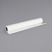 A white roll of Canon Matte Scrim Vinyl Banner paper.