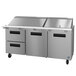 A Hoshizaki stainless steel refrigerated sandwich prep table with drawers.