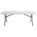 A white rectangular table with black legs.