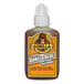 A bottle of Gorilla Glue with a white cap and a monkey on the label.