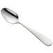 a silver spoon on a white background