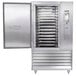 A Traulsen stainless steel blast chiller with a door open over trays.