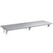 A Regency stainless steel pass-through shelf with brackets.