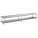 A long silver Regency stainless steel wall mount shelf with two shelves.