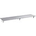 A Regency stainless steel pass-through shelf.